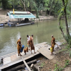  After a short walk we get ready to take the boat across the river